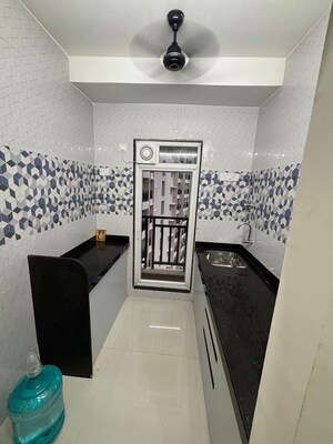 Kitchen in 1 BHK Apartment at Raunak Bliss, Ghodbunder Road – for Rent