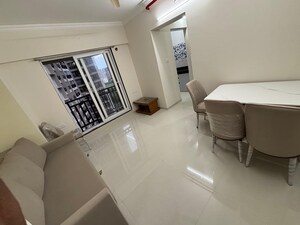 Living Room in 1 BHK Apartment at Raunak Bliss, Ghodbunder Road – for Rent