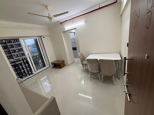 Living Room in 1 BHK Apartment at Raunak Bliss, Ghodbunder Road – for Rent