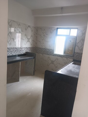 Kitchen in 2 BHK Apartment at DGS Sheetal Tapovan, Malad East – for Rent