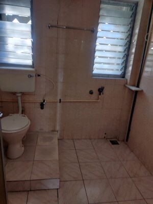 Bathroom in 2 BHK Apartment at Troika Apartment, Andheri West – for Rent