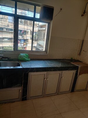 Kitchen in 2 BHK Apartment at Troika Apartment, Andheri West – for Rent