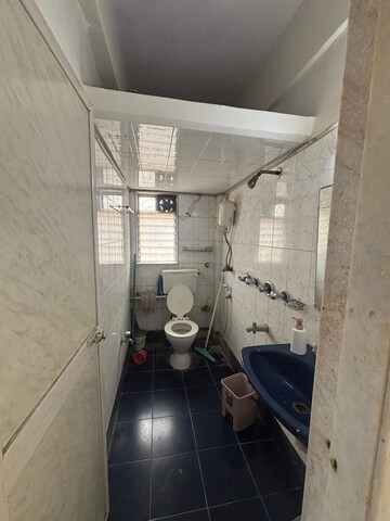 Bathroom in 2 BHK Apartment at Troika Apartment, Andheri West – for Rent