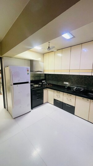 Kitchen in 2 BHK Apartment at New Sumangal CHS, Chunabhatti – for Rent