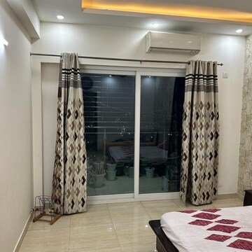 Bedroom in 3.5 BHK Apartment at Gaur Sportswood, Sector 79 – for Rent