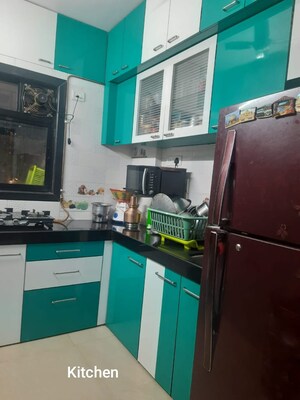 Kitchen in 2 BHK Apartment at Parijat Gardens Marigold CHS, Kasarvadavali – for Rent
