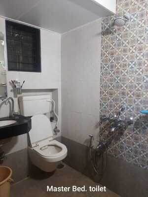 Bathroom in 2 BHK Apartment at Parijat Gardens Marigold CHS, Kasarvadavali – for Rent