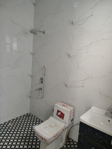 Bathroom in 3 BHK Builder Floor at Dhakoli – for Sale