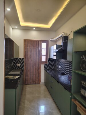 Kitchen in 3 BHK Builder Floor at Dhakoli – for Sale