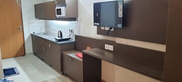 Kitchen in 1 RK Apartment at Paramount Golf Forest Studio Apartments - OAK Towe, Zeta I Greater Noida – for Rent
