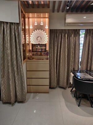 Living Room in 1 BHK Apartment at Raunak Bliss, Ghodbunder Road – for Rent