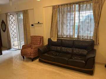 Living Room in 2 BHK Apartment at Gera Song Of Joy, Kharadi – for Rent