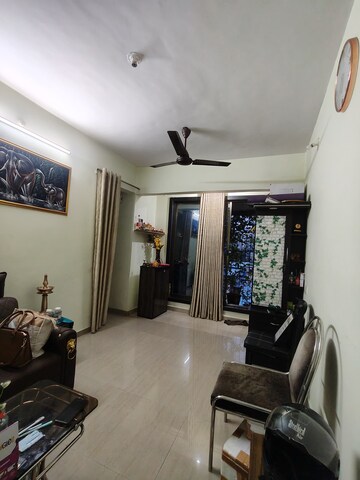 Living Room in 1 BHK Apartment at Kopar Khairane – for Sale