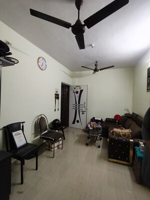Living Room in 1 BHK Apartment at Kopar Khairane – for Sale