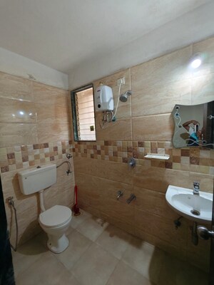 Bathroom in 1 BHK Apartment at Raunak Heights, Ghodbunder Road – for Rent