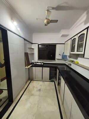 Kitchen in 2 BHK Apartment at Chereshwar CHS, Trombay – for Rent