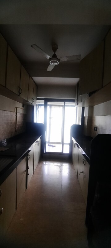Kitchen in 3 BHK Apartment at Shiv Parvati Apartments Andheri, Andheri West – for Rent
