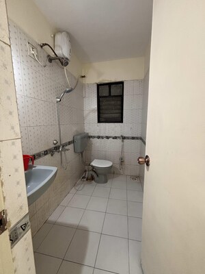 Bathroom in 2 BHK Apartment at Goel Ganga Hill Mist Garden, Kondhwa – for Rent