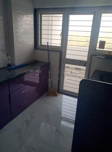 Kitchen in 2 BHK Apartment at Suvan Shades, Mundhwa – for Rent