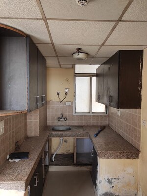 Kitchen in 2 BHK Apartment at Supertech Czar Suites, Omicron I Greater Noida – for Rent