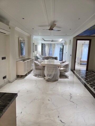 Living Room in 2 BHK Builder Floor at Boutique Residential Apartments C-253, Defence Colony – for Rent