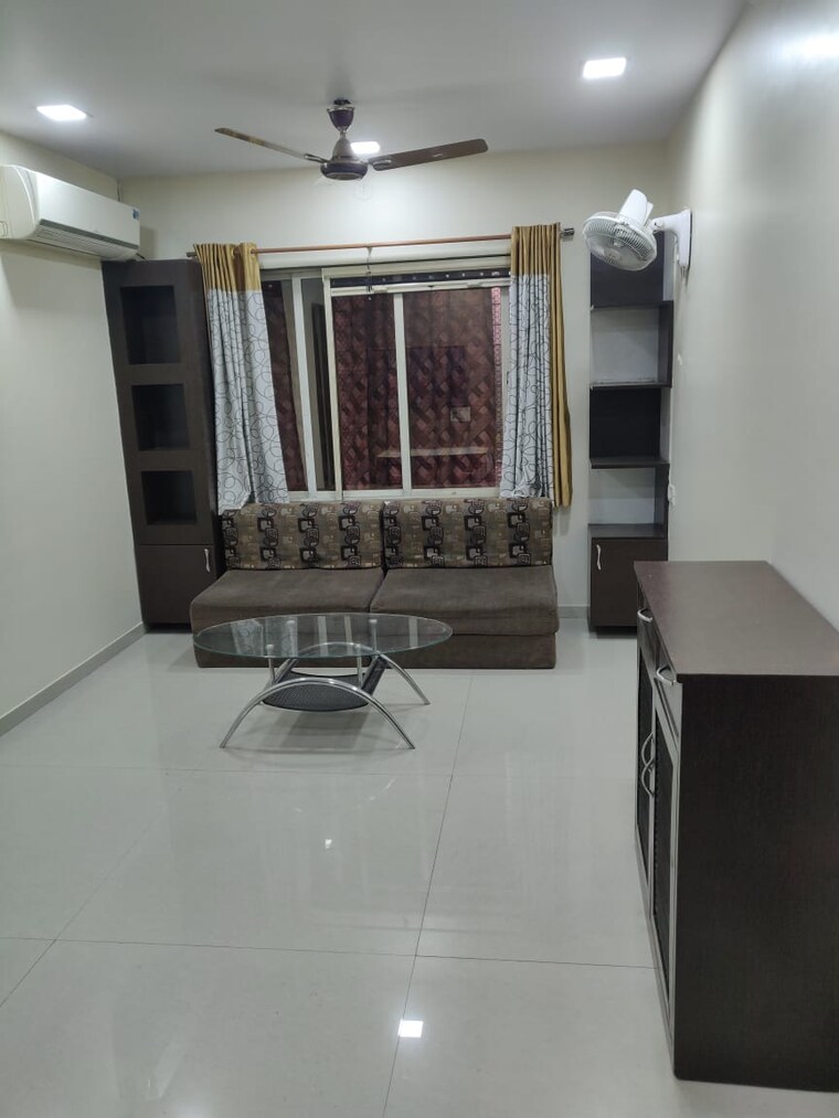 Living Room, cosmos-springs-angel 1 Bedroom 450 Sq.Ft. Apartment In Ghodbunder Road Thane 9253319