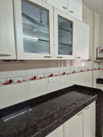 Kitchen in 2 BHK Apartment at Red Rose CHS 1, Andheri West – for Rent
