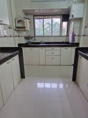 Kitchen in 2 BHK Apartment at Red Rose CHS 1, Andheri West – for Rent