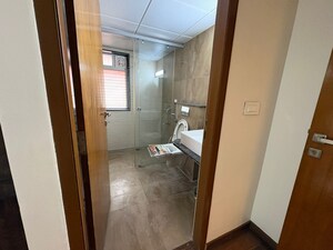Bathroom in 3 BHK Apartment at Elegant Elysee, Mg Road – for Rent