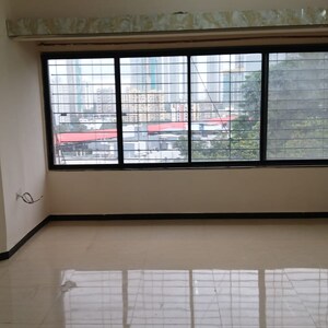 Room in 2 BHK Apartment at Malad East – for Rent