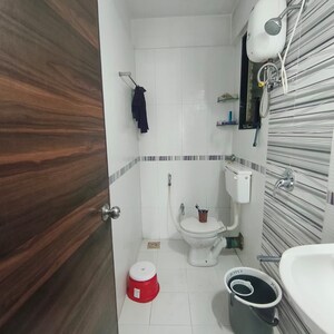 Bathroom in 1 BHK Apartment at Mahavir Kalpavruksha, Ghodbunder Road – for Rent
