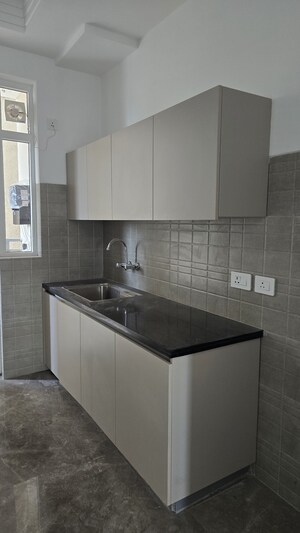 Kitchen in 3 BHK Apartment at Ace Starlit, Sector 152 – for Rent