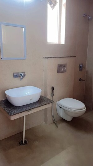 Bathroom in 2 BHK Apartment at Affinity Greens, International Airport Road – for Rent