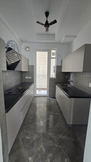 Kitchen in 3 BHK Apartment at Ace Starlit, Sector 152 – for Sale