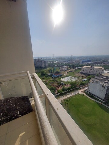 Balcony in 2.5 BHK Apartment at Mahagun Meadows, Sector 150 – for Rent