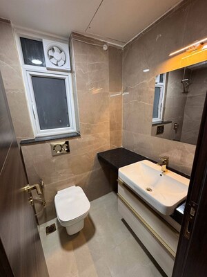 Bathroom in 3 BHK Apartment at Smart World Orchard, Sector 61 – for Rent