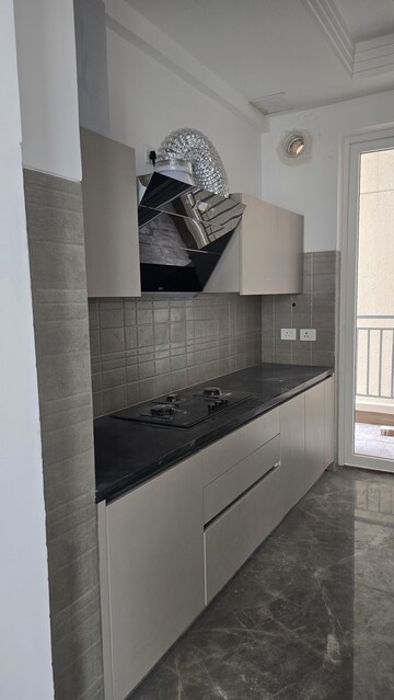 Kitchen in 2 BHK Apartment at Ace Starlit, Sector 152 – for Rent