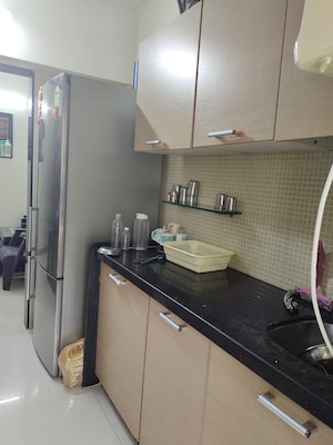 Kitchen in 1 BHK Apartment at Charkop Gaon – for Sale