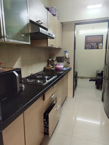 Kitchen in 1 BHK Apartment at Charkop Gaon – for Sale