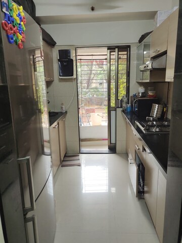 Kitchen in 1 BHK Apartment at Charkop Gaon – for Sale