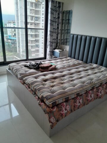Bedroom in 3 BHK Apartment at Pranav Flora Enclave, Borivali East – for Sale