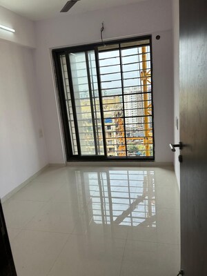 Room in 2 BHK Apartment at Acme Avenue, Kandivali West – for Rent