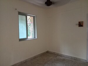 Room in 2 BHK Apartment at Varsha Milan CHS, Chakala – for Sale
