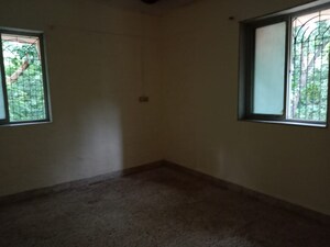 Room in 2 BHK Apartment at Varsha Milan CHS, Chakala – for Sale
