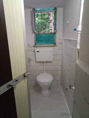 Bathroom in 2 BHK Apartment at Varsha Milan CHS, Chakala – for Sale