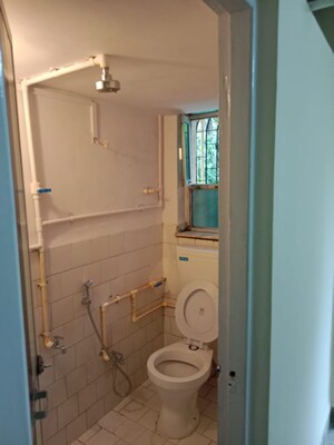 Bathroom in 2 BHK Apartment at Varsha Milan CHS, Chakala – for Sale