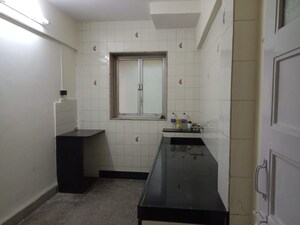 Kitchen in 2 BHK Apartment at Varsha Milan CHS, Chakala – for Sale