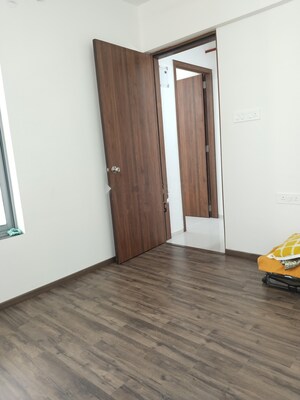 Room in 2 BHK Apartment at Saarrthi Skybay, Mahalunge – for Rent