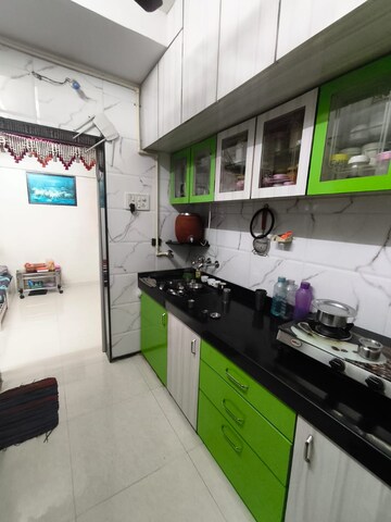 Kitchen in 1 BHK Apartment at Surya Gokul Residency, Kandivali East – for Rent