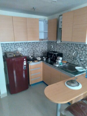 Kitchen in 1 RK Apartment at Supertech Czar Suites, Omicron I Greater Noida – for Sale